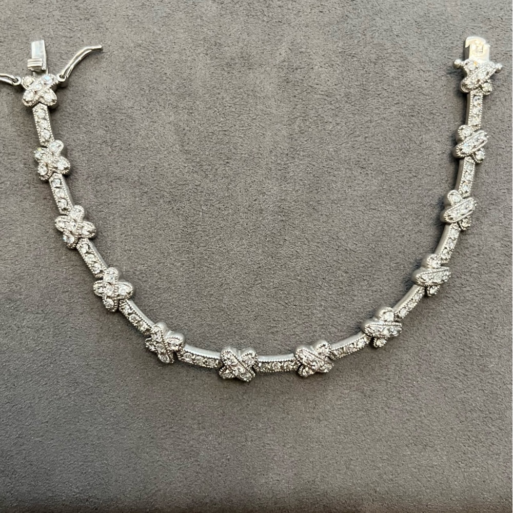 Cubic zirconia silver tennis bracelet with cross design